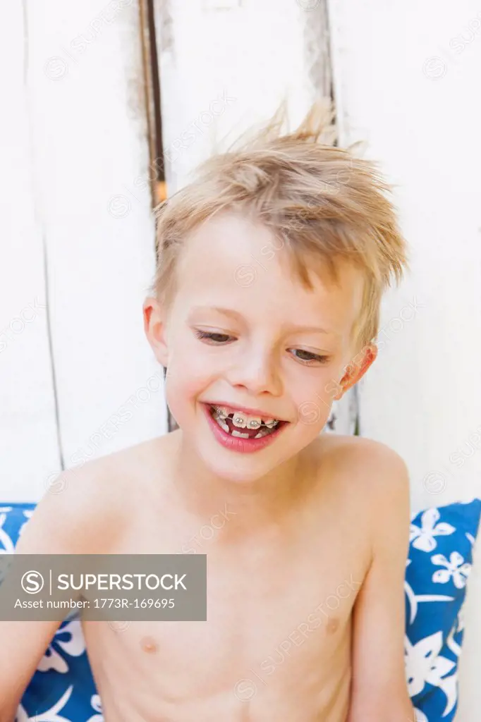 Close up of boy with braces smiling