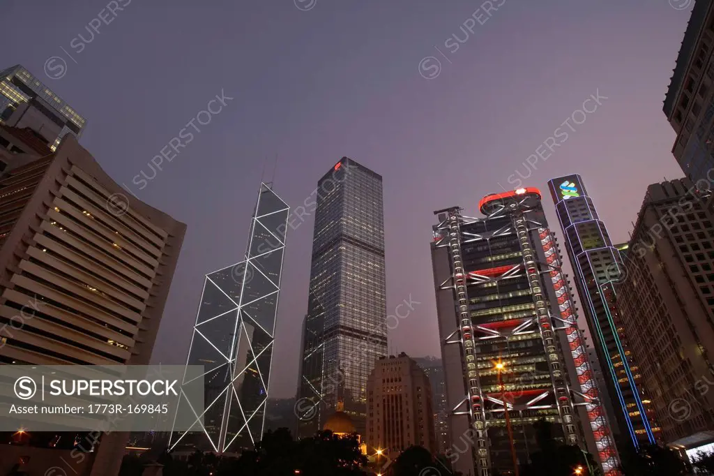 Urban skyscrapers lit up at night