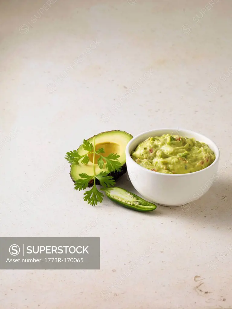 Bowl of guacamole with avocado