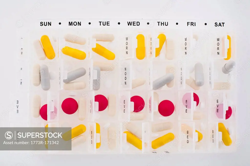 Portions of pills in organizer