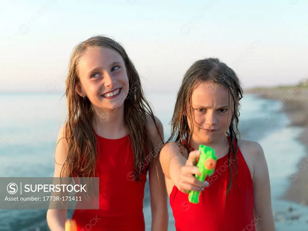 Girls playing on beach together