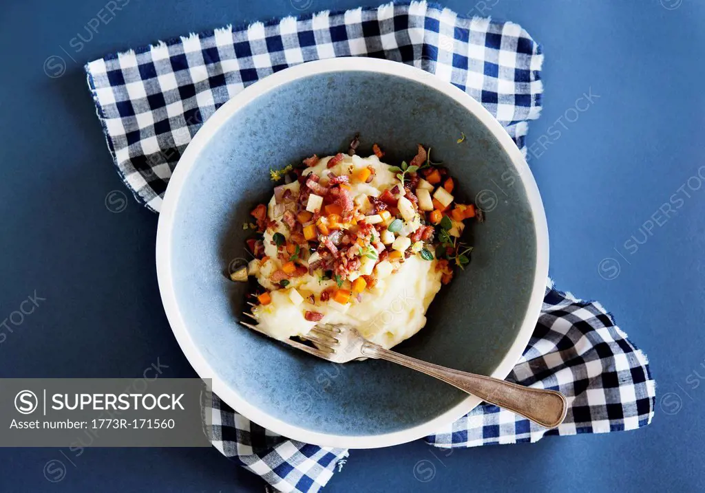 Bowl of mashed potato with bacon