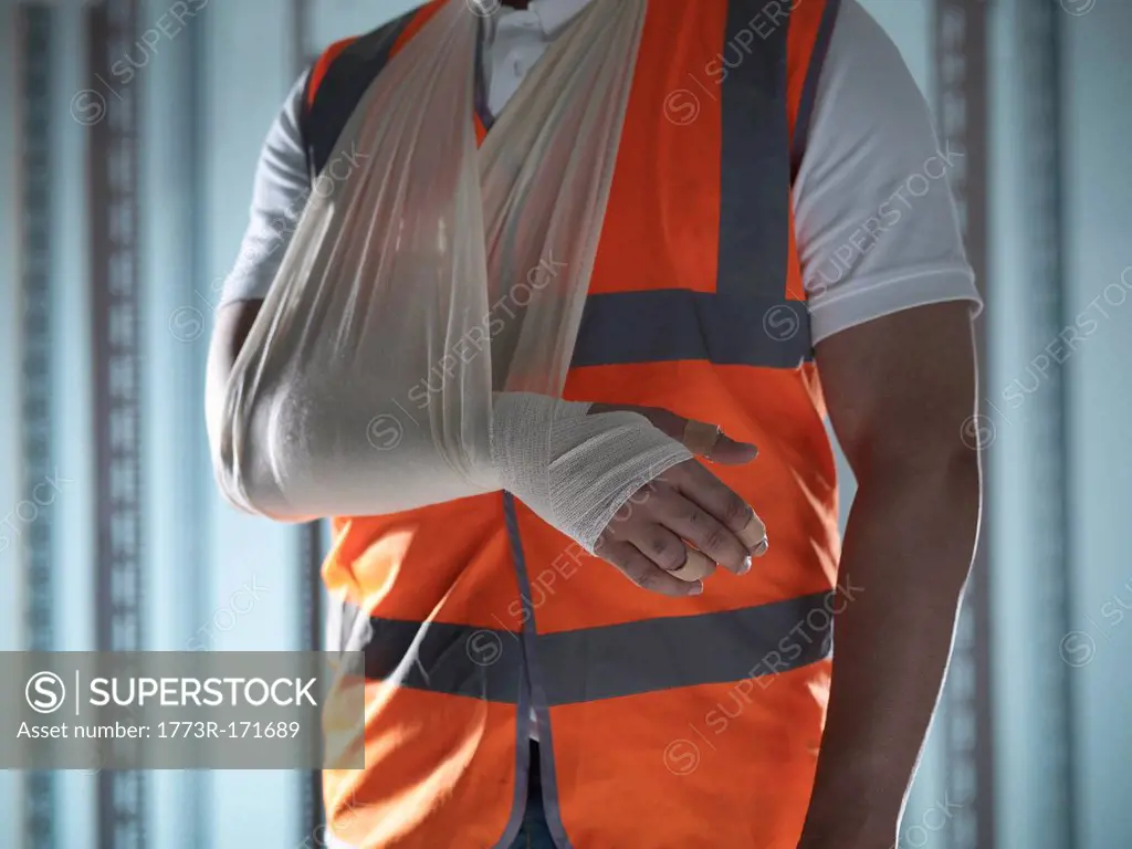 Close up of worker with arm in sling