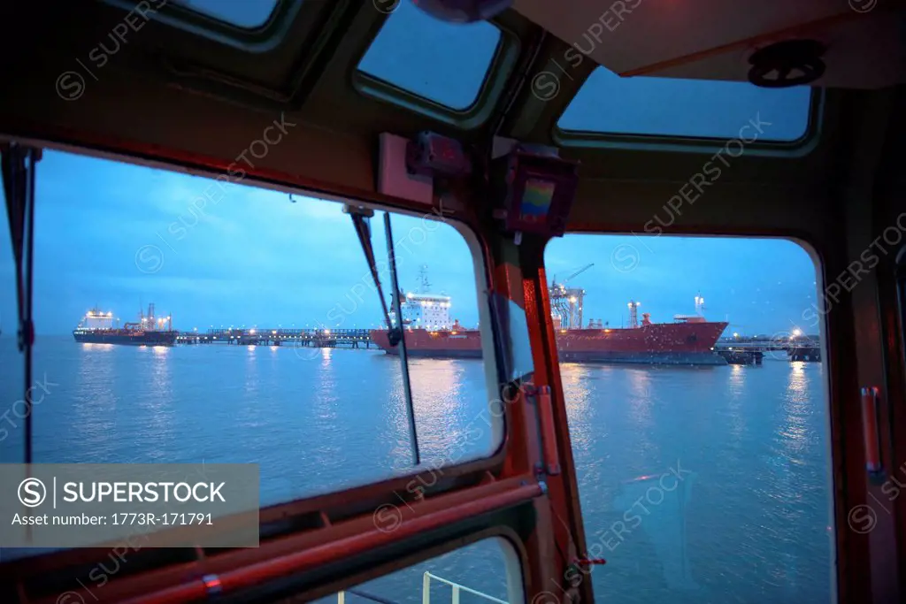 Tanker ships as seen from tugboat