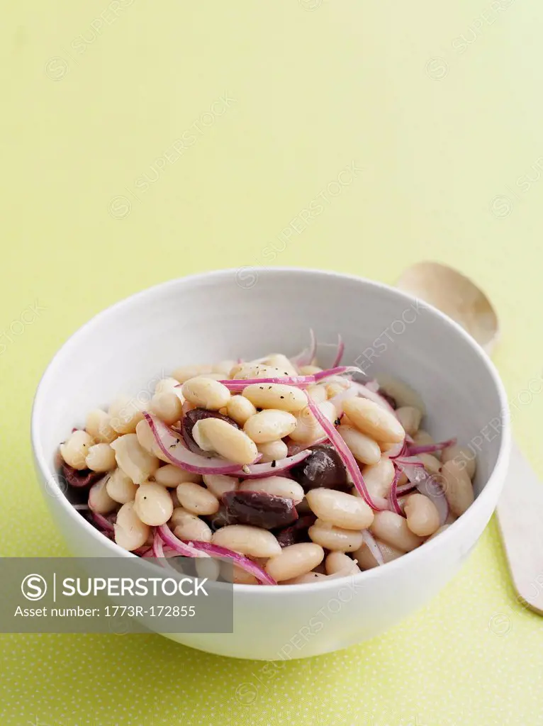 Bowl of beans salad with olives