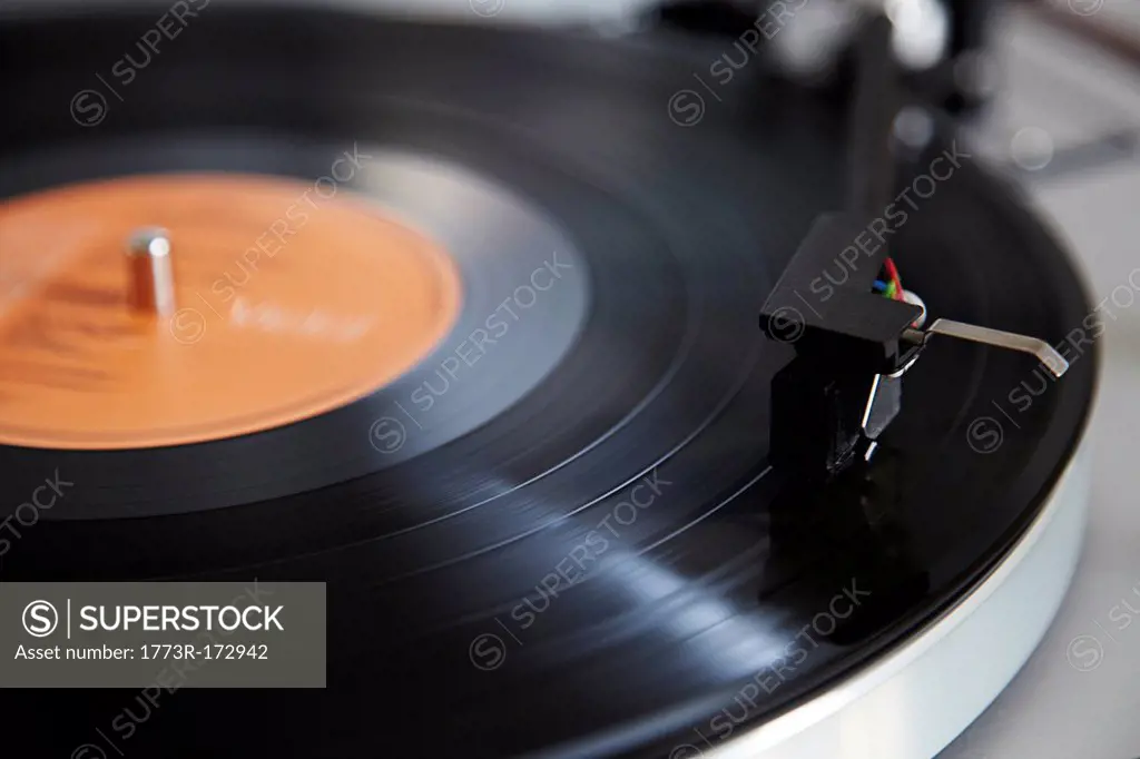 Close up of needle playing record