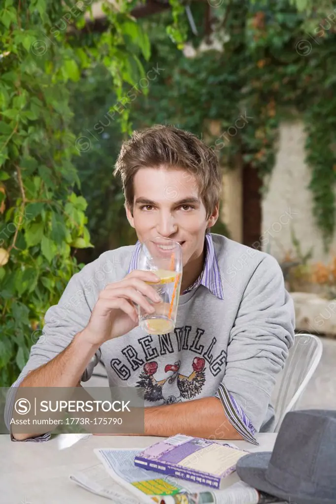 Man drinking soft beverage