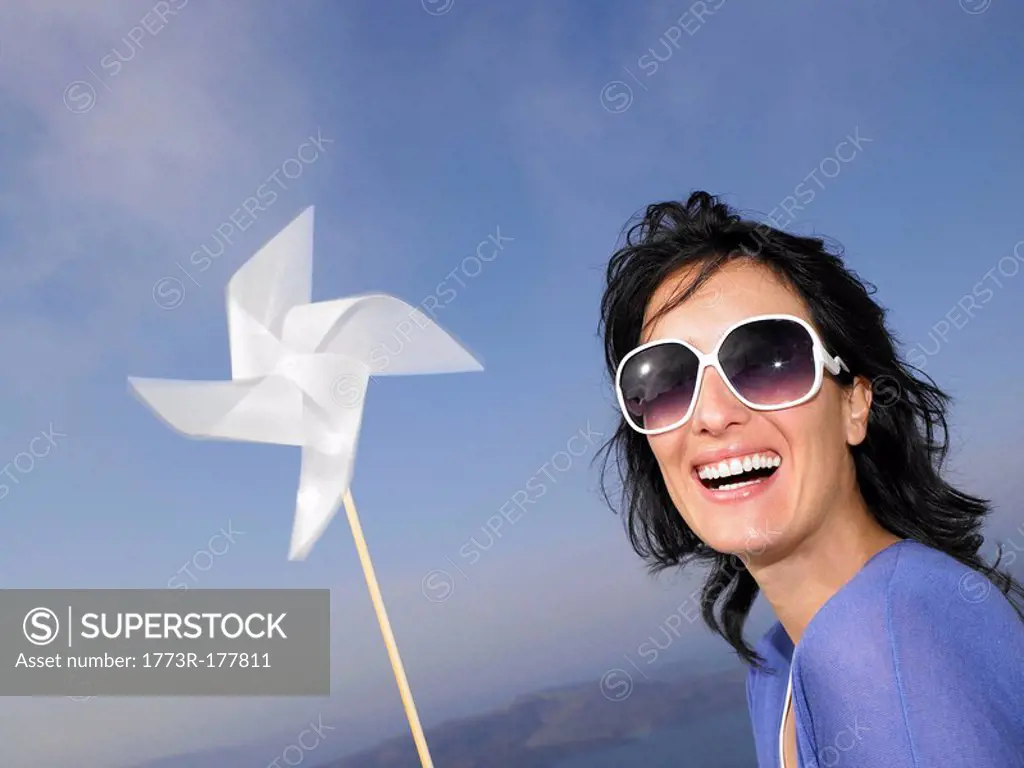 Woman holding a windmill