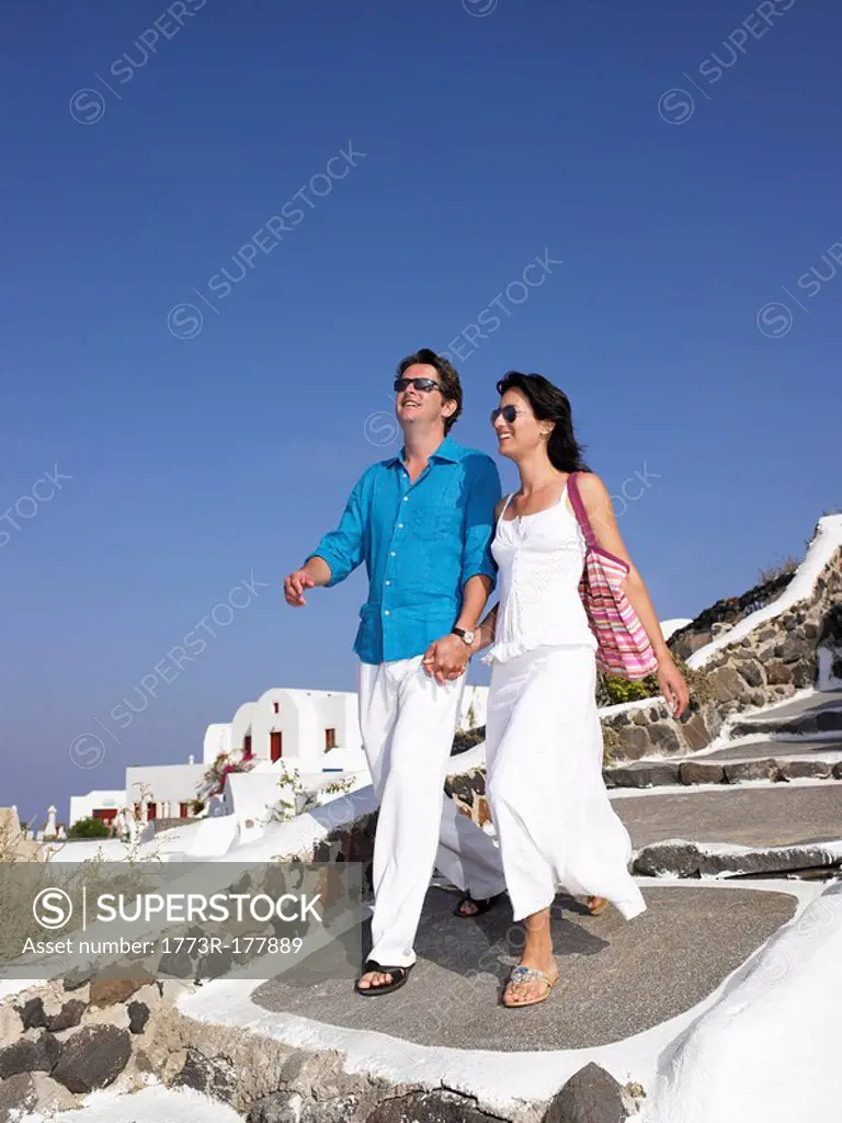 Couple climbing down the stairs