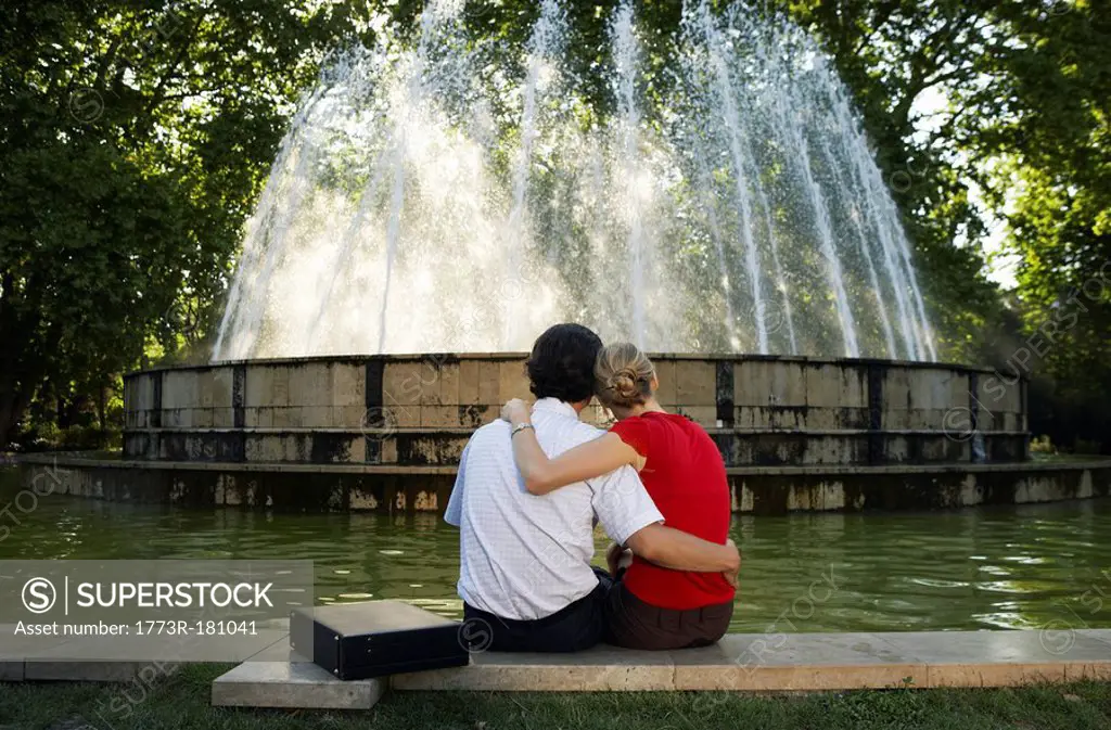 Couple by fountain