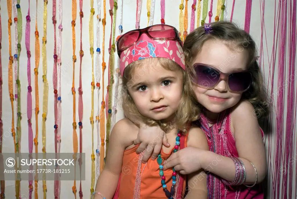 Two girls 2-4 dressed for a party