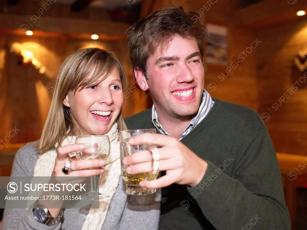 Couple having drinks in restaurant
