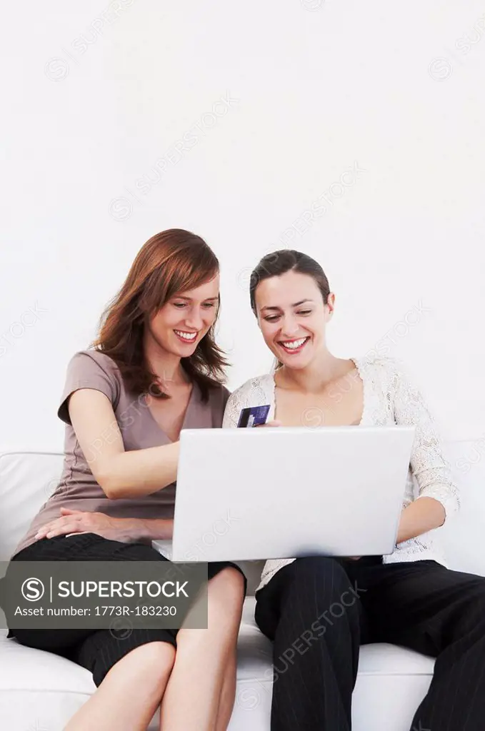 Female friends make online purchase