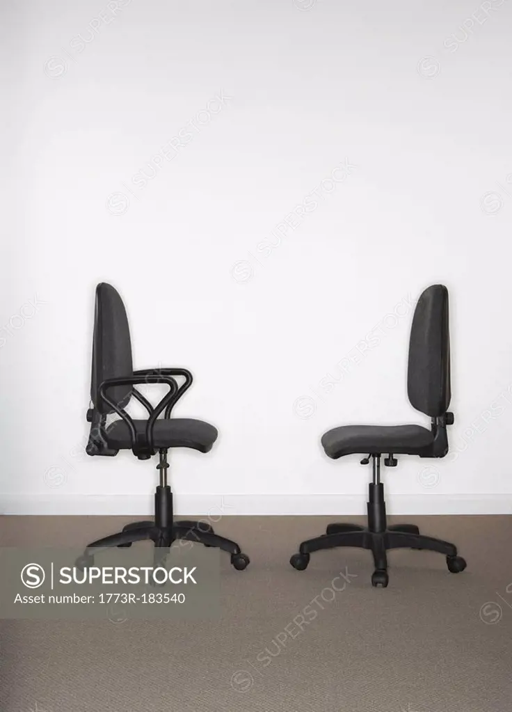 Two office chairs facing each other