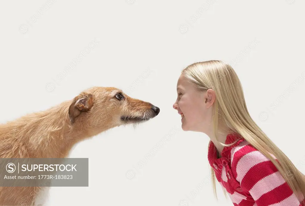 Profile of girl and lurcher