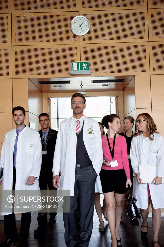Business people and doctors in office