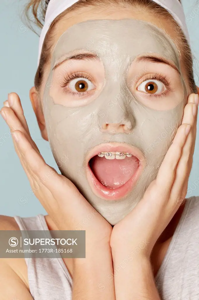 Smiling girl wearing face mask