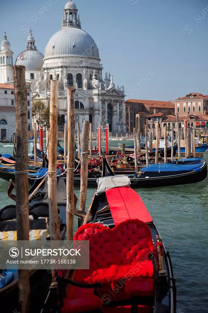 Gondolas docked on Venice canal