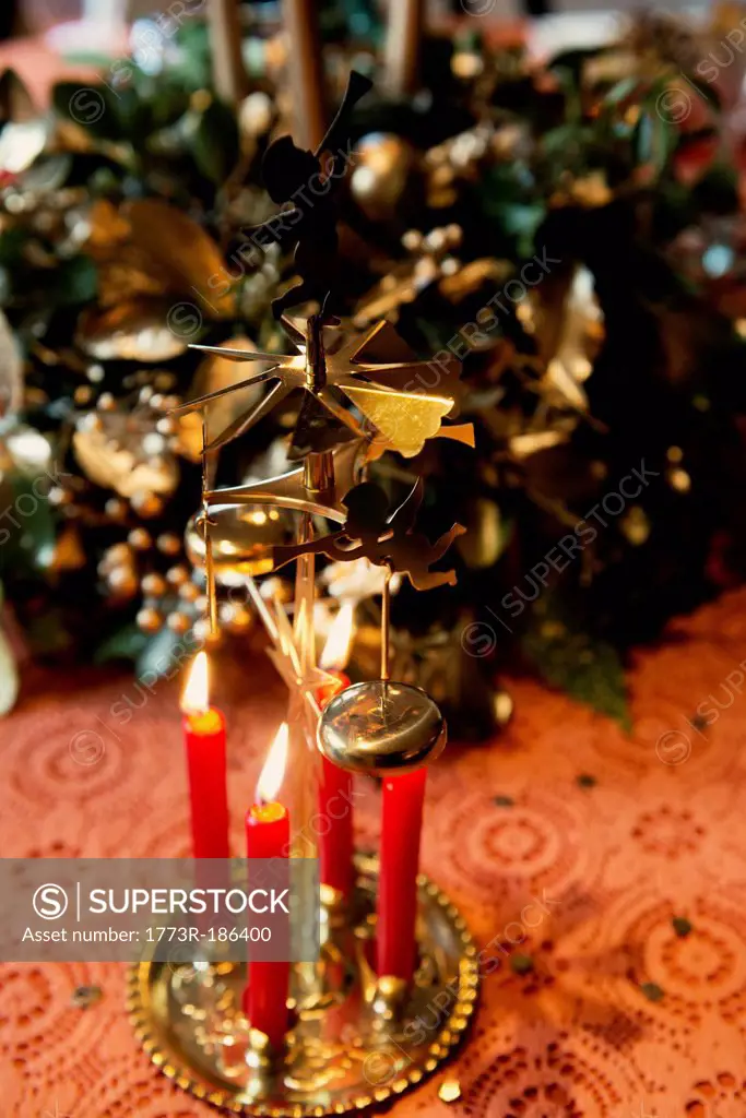 Candles burning on Christmas decoration
