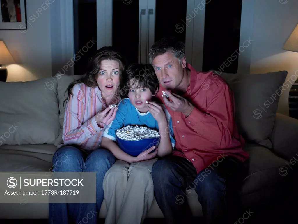 Family watching movie together