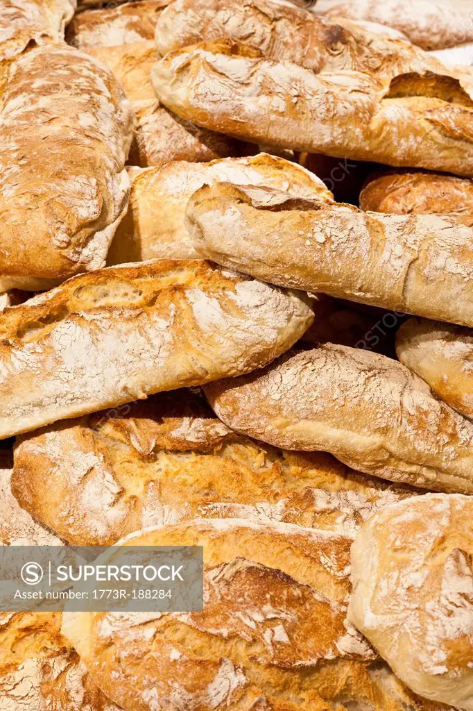 Pile of crusty bread loaves