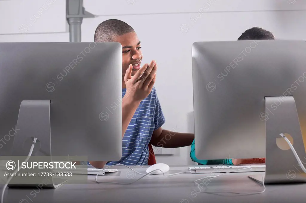 Children using computers at desk