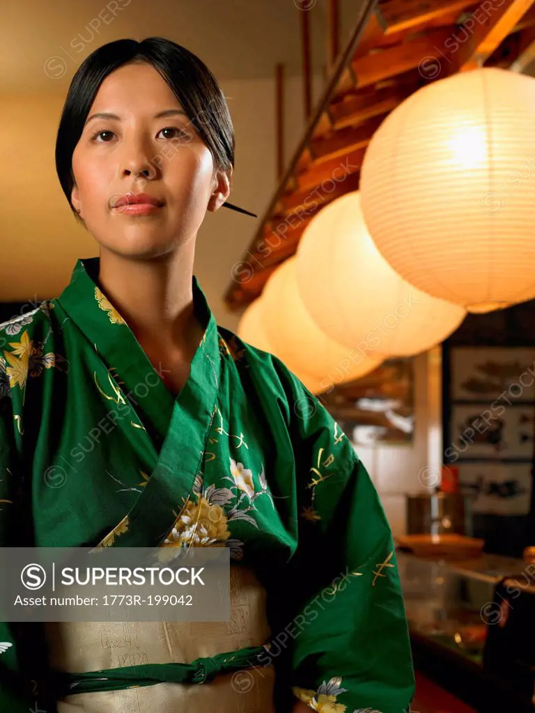 Young woman wearing traditional Asian clothing