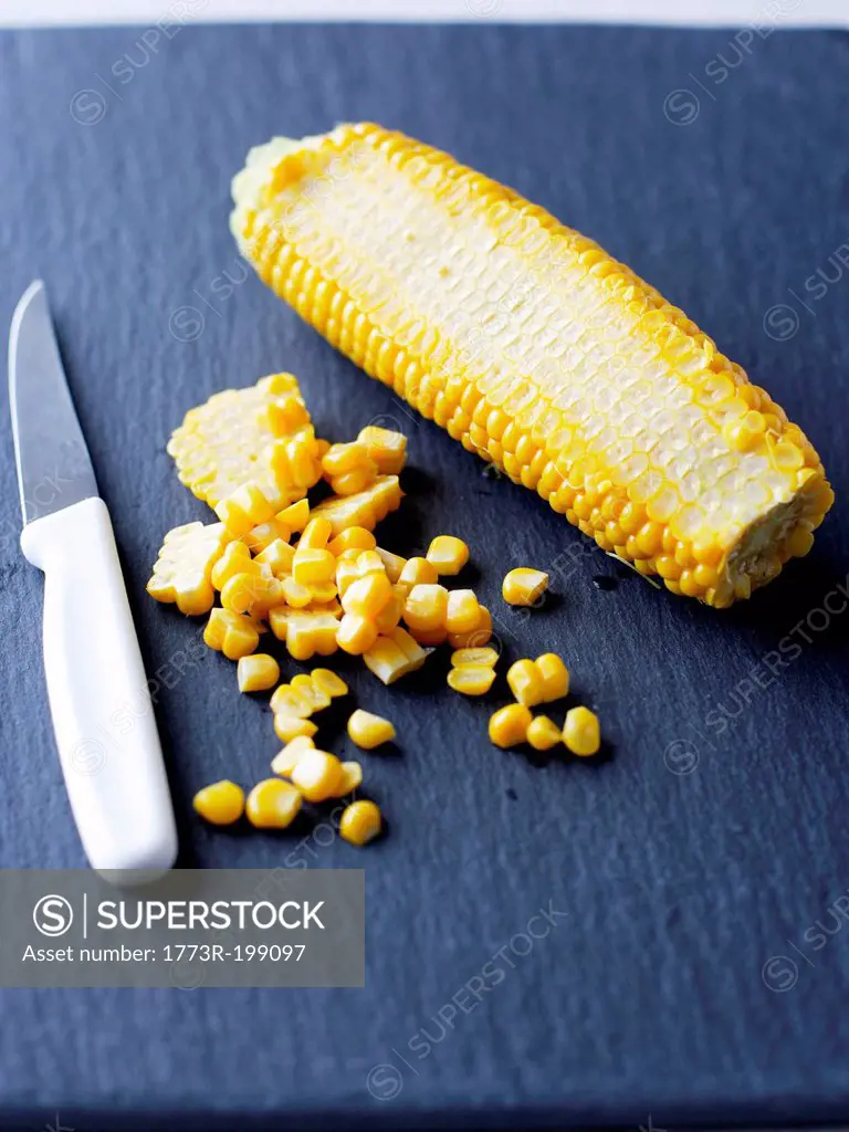 Corn on the cob and knife