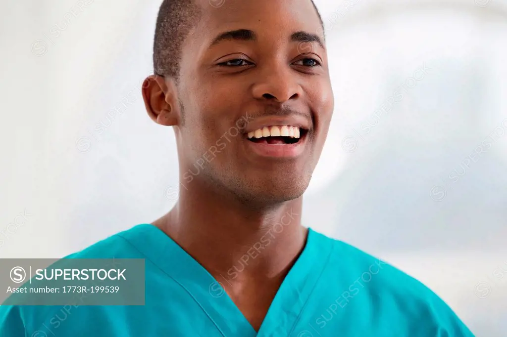 Portrait of young man wearing surgical scrubs