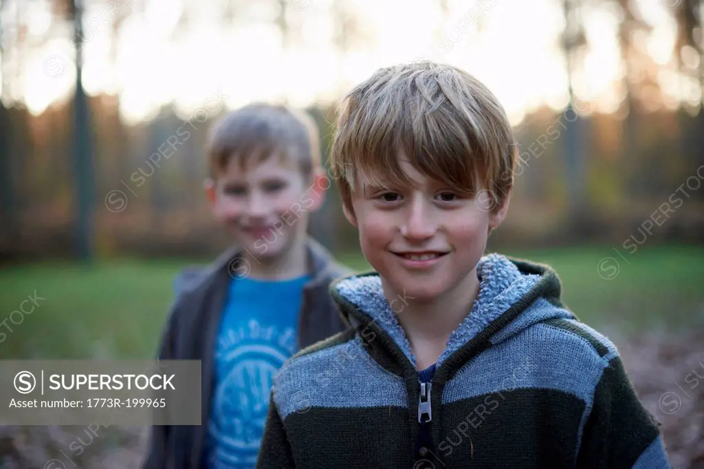 Portrait of boys in forest