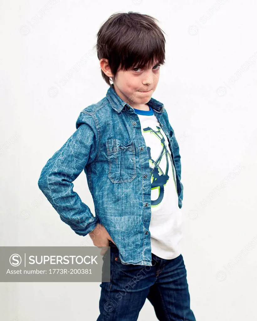 Portrait of boy against white background