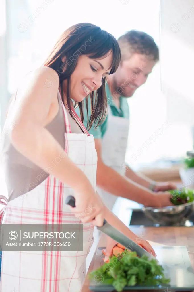 Couple preparing food
