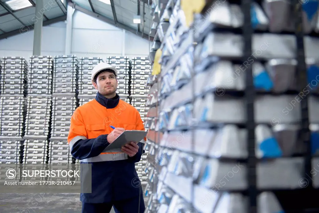 Warehouse worker checking stock