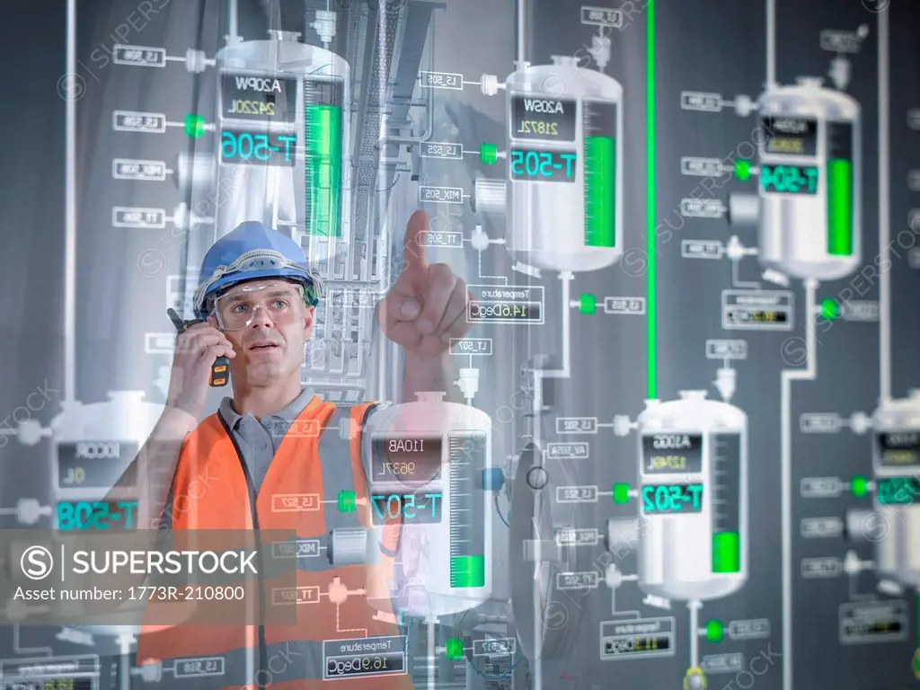 Factory supervisor monitoring product levels on interactive display