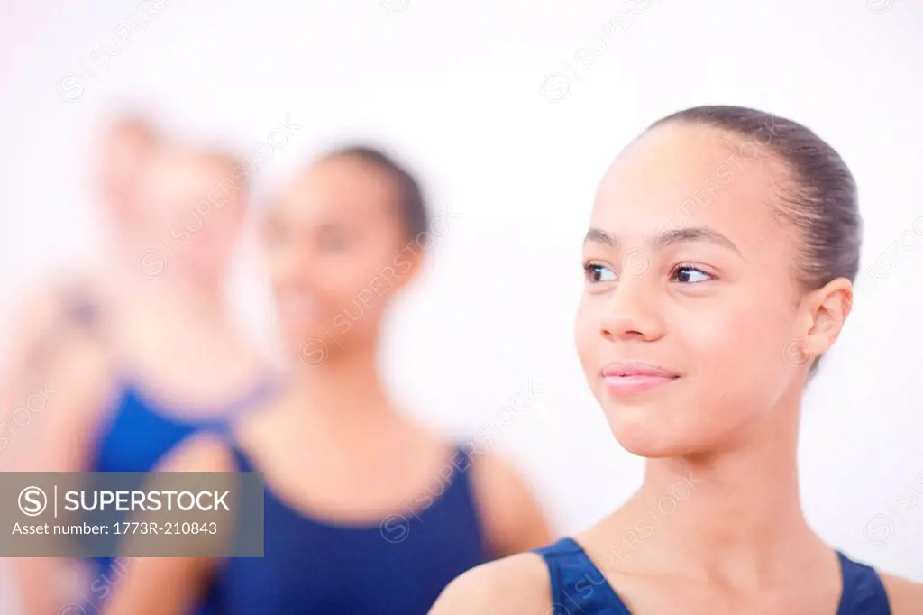 Teenage ballerinas in class