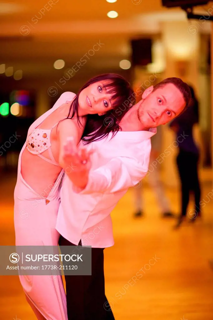 Young ballroom dancers in pose, portrait
