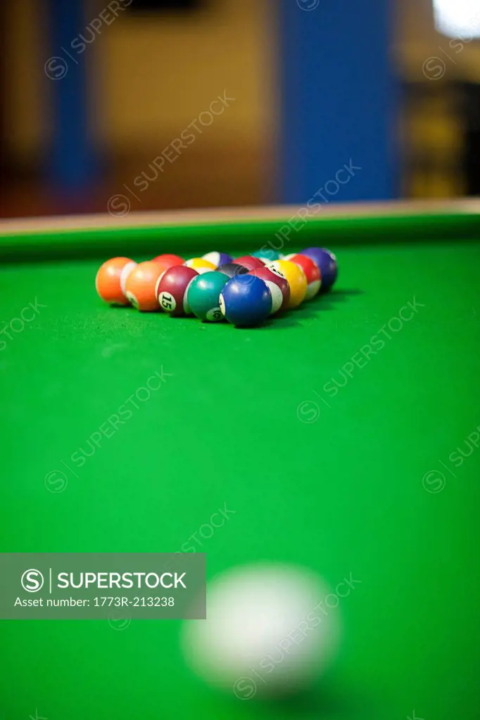 Set of undisturbed pool balls on table