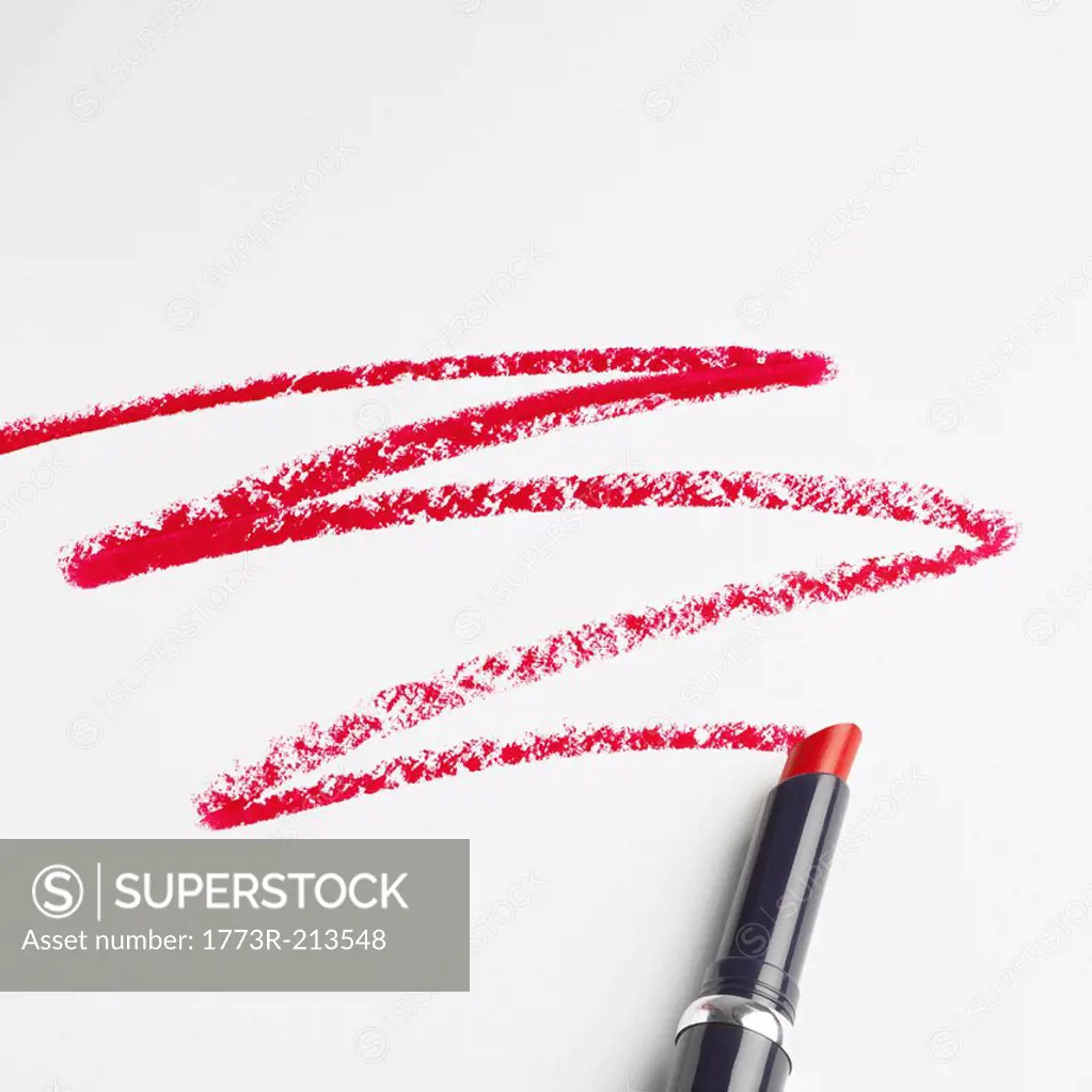 Lipstick zigzag pattern on white background