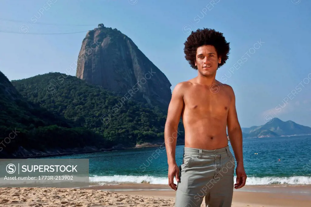 Portrait of man on beach, Rio de Janeiro, Brazil