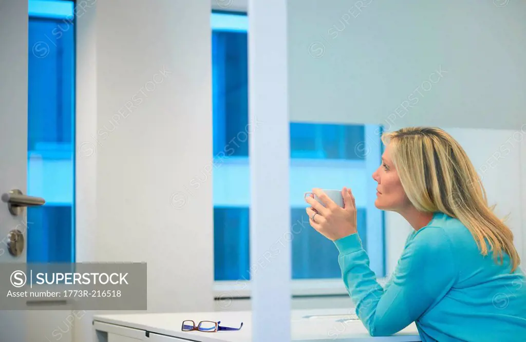 Businesswoman working late at office