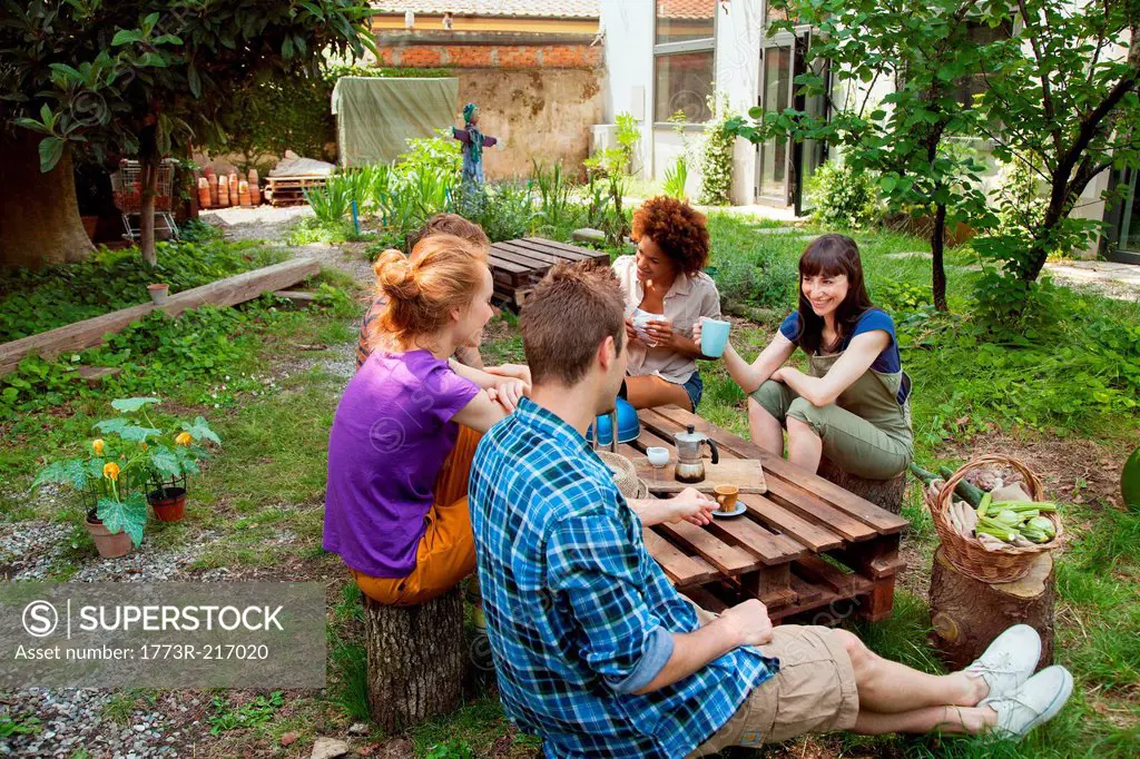 Friends sitting in garden