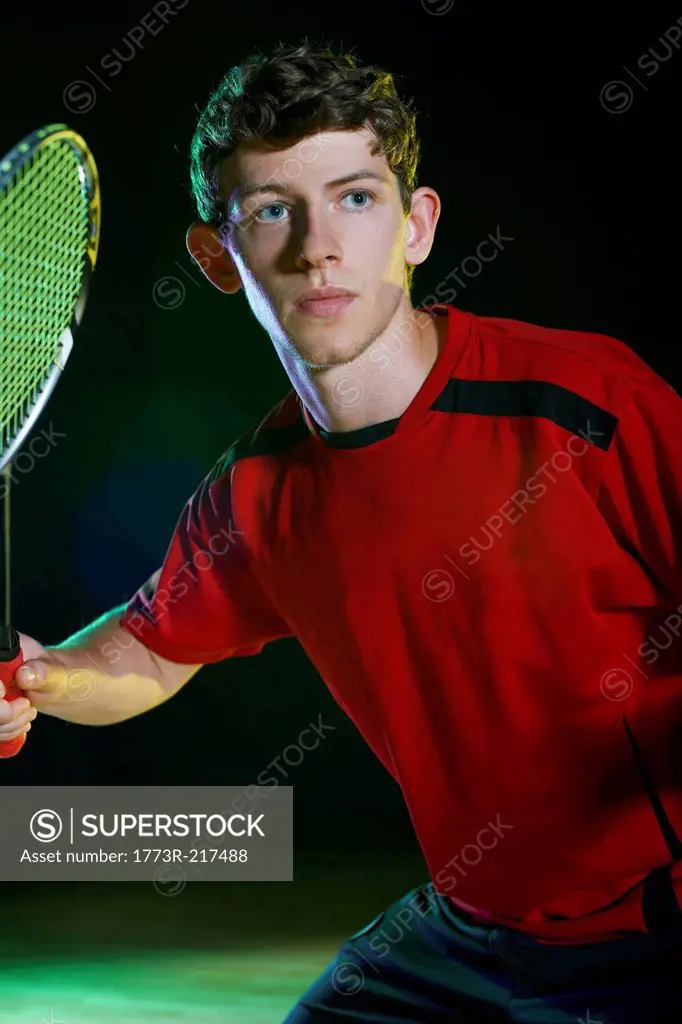 Close up of young male badminton player