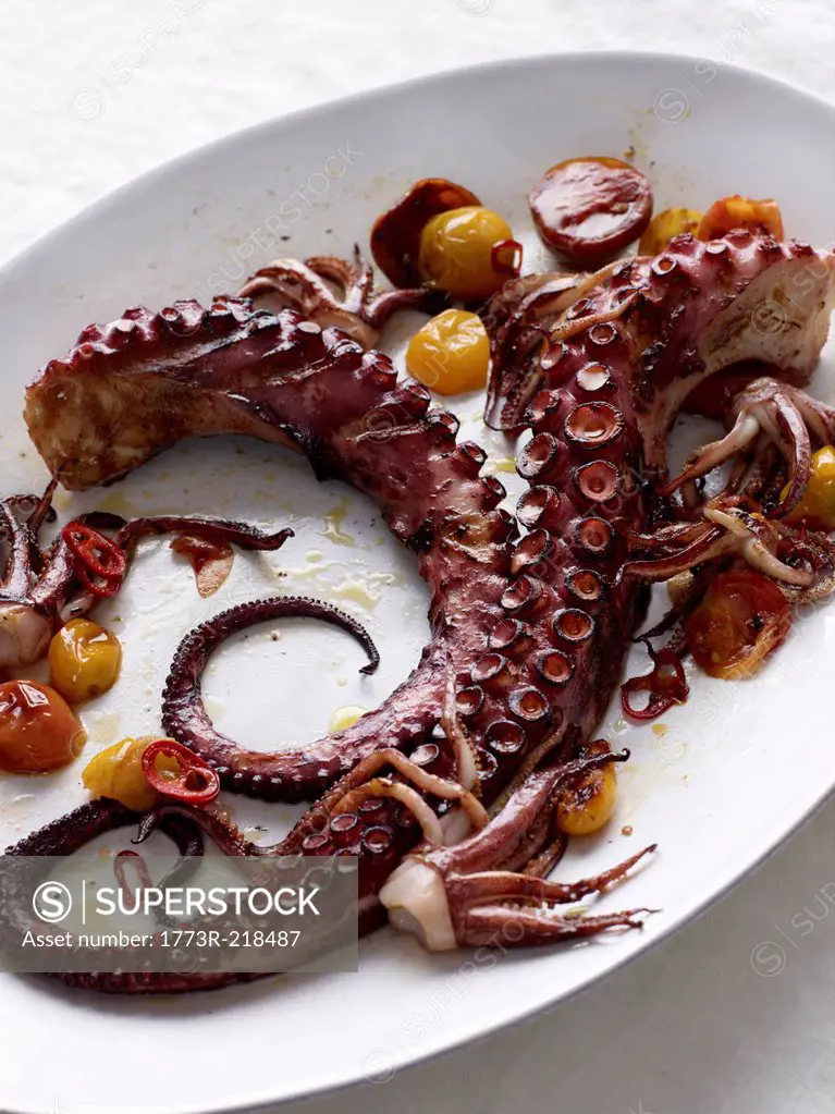 Octopus with roasted tomatoes and chilli peppers