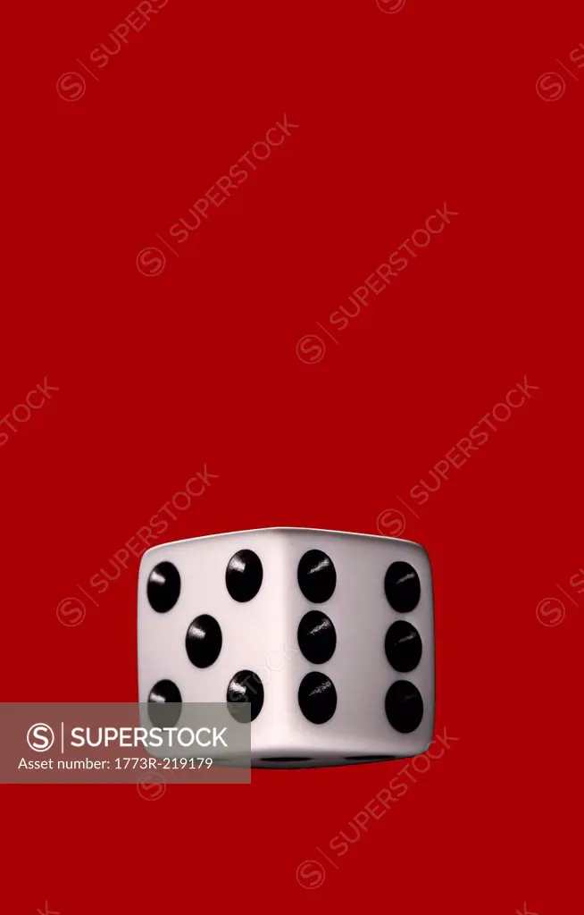 Still life of dice with red background