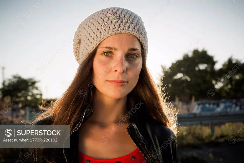 Portrait of young woman wearing beanie