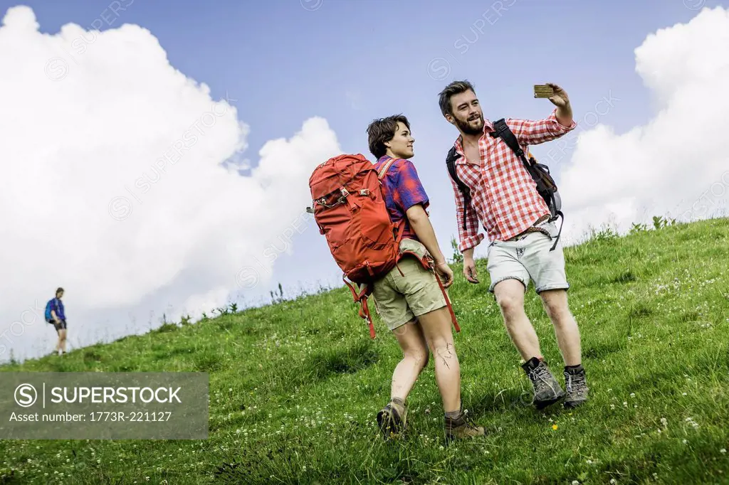 Young adults hiking, Tyrol, Austria