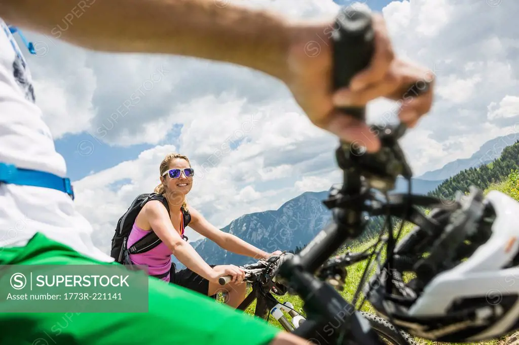 Couple on mountain bikes, Tyrol, Austria