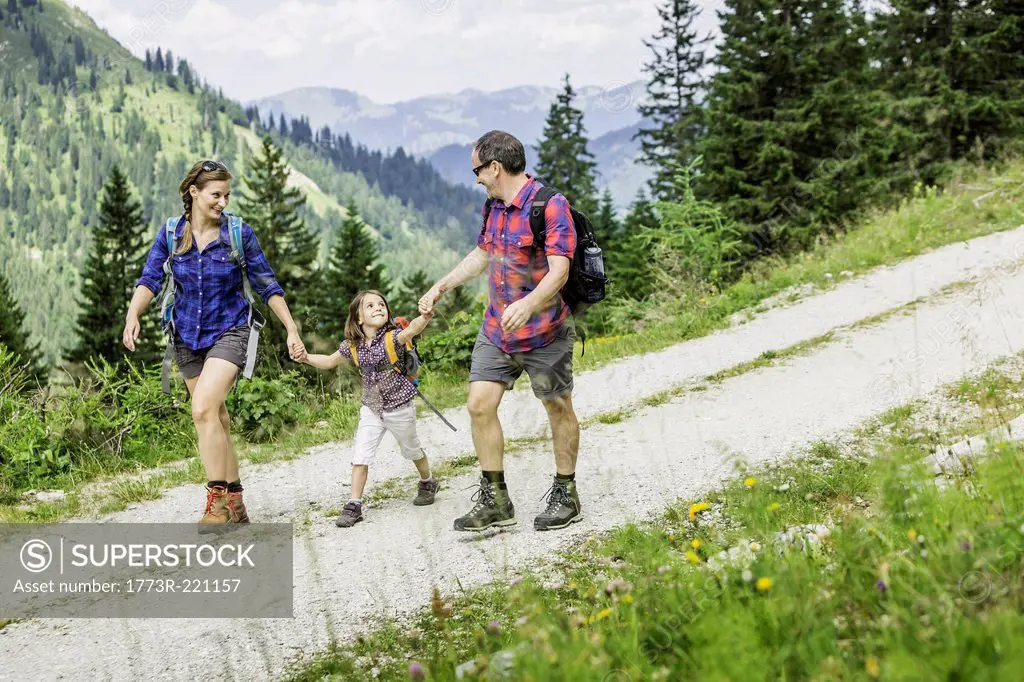 Parents and daughter hiking, Tyrol, Austria