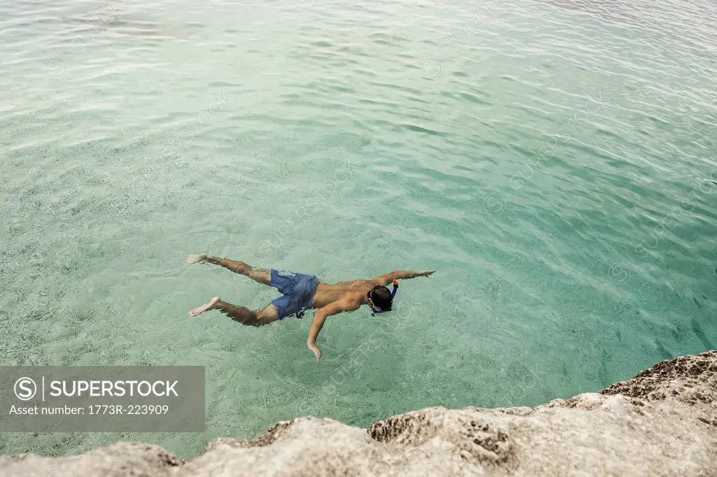 Man swimming in sea, Cala Goloritze, Sardinia, Italy