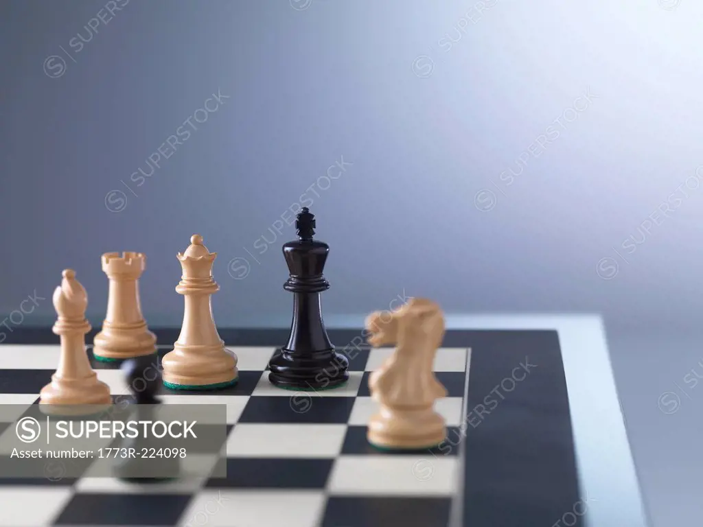 Chess game, player preparing to check mate